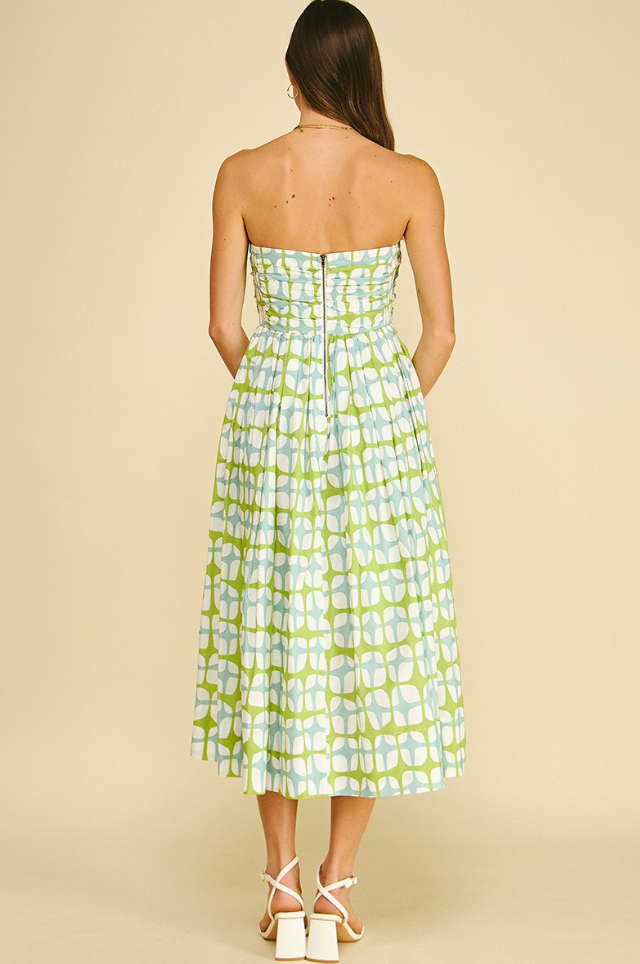 blue and green strapless dress with geometric pattern and a back zipper