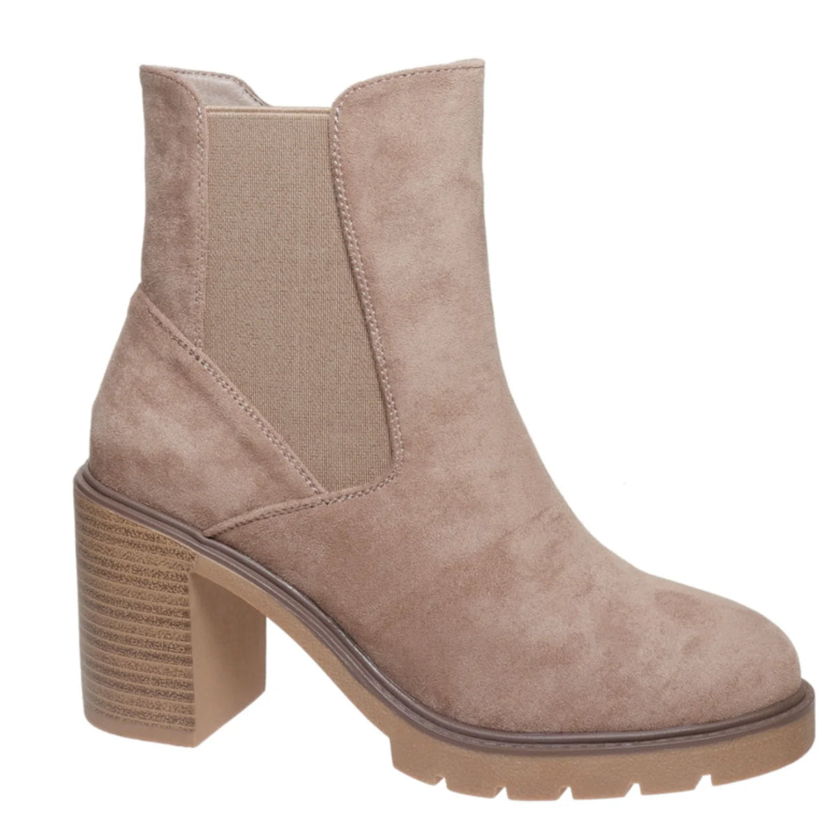 A taupe suede ankle boot with a chunky block heel and elastic side panels, shown from a side profile on a white background.