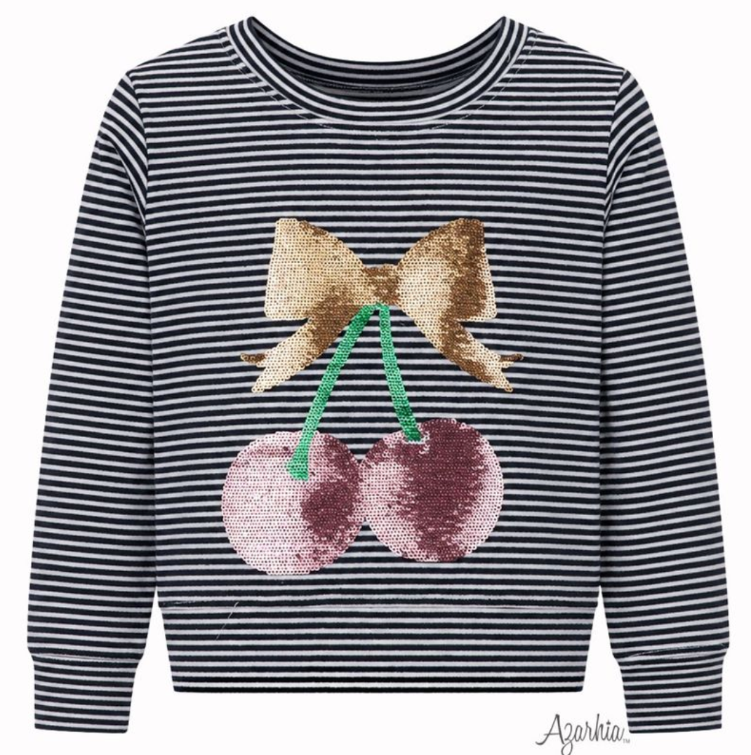 A kids' long-sleeve crewneck sweatshirt featuring navy and white horizontal stripes, with a sequined cherry graphic on the front showing a gold bow and pink cherries.