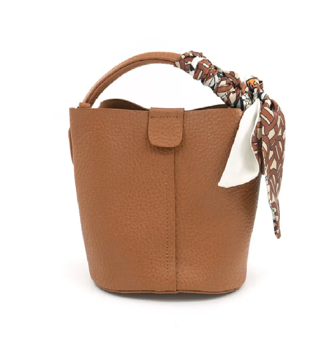 A brown pebbled leather bucket bag with a top handle and a patterned scarf tied to the handle, shown against a plain white background.