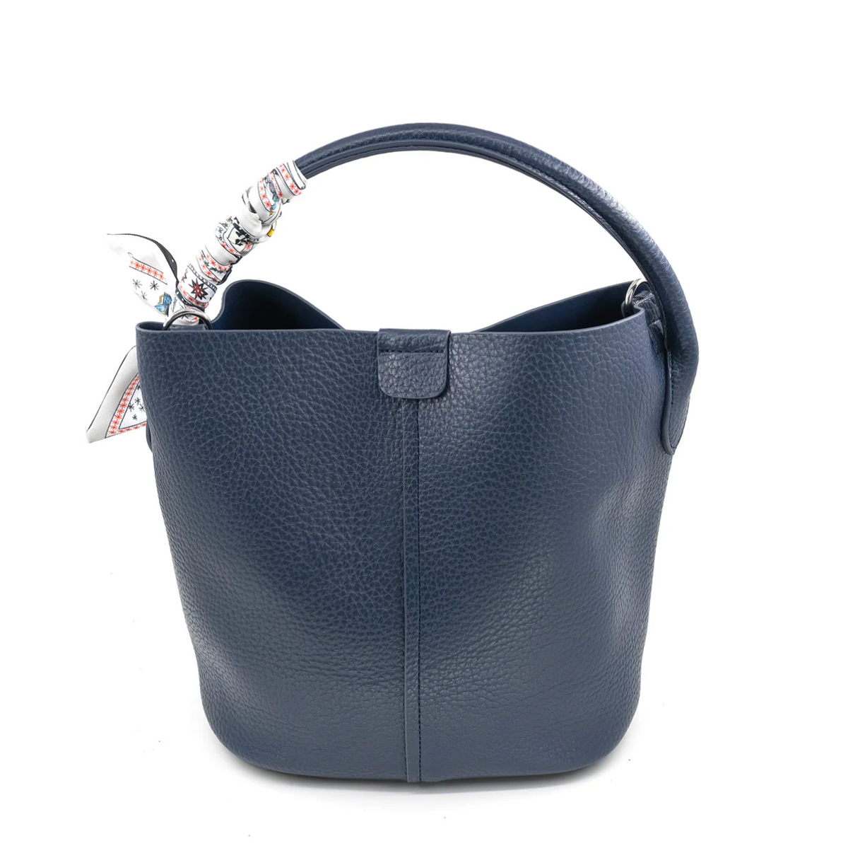 A navy blue pebbled leather bucket bag with a top handle, featuring a decorative multicolor patterned ribbon tied to the handle, set against a plain white background.