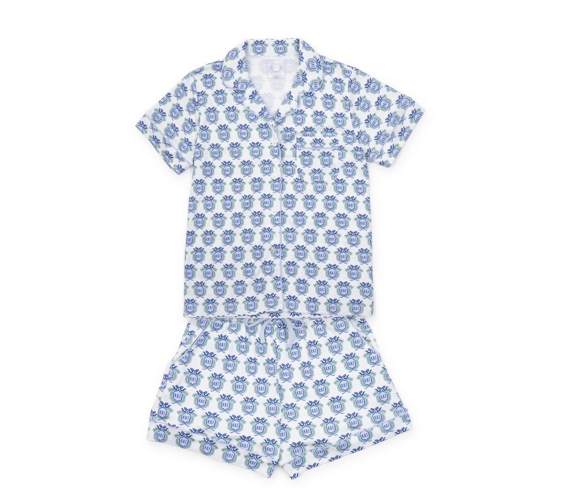 A two-piece children's pajama set featuring a short-sleeve collared shirt and matching shorts, both printed with a repeating blue floral pattern on a white background.