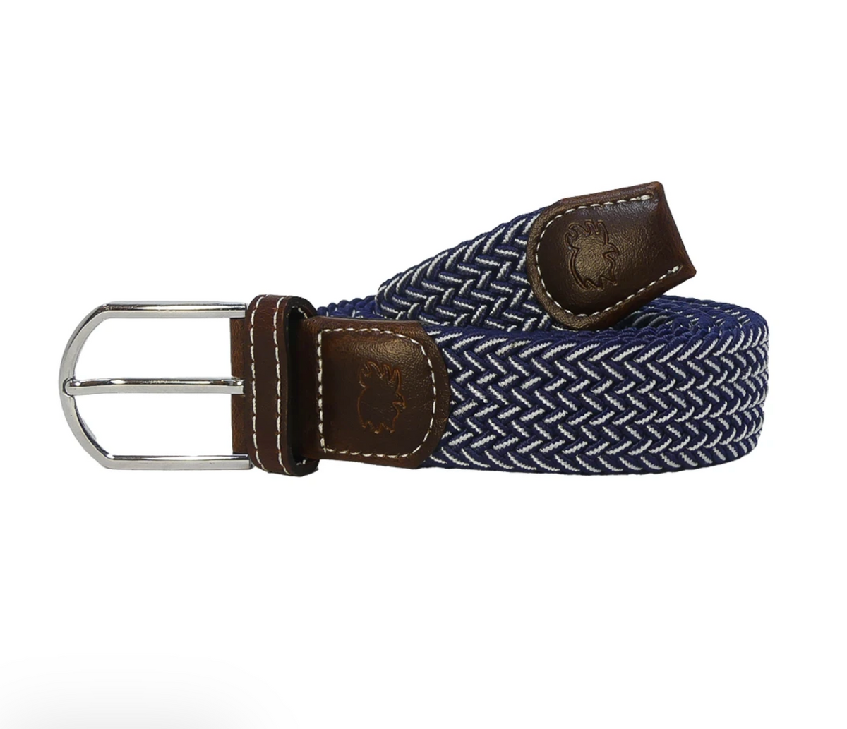 Blue and white patterned belt with brown and silver hardware on a white background. 