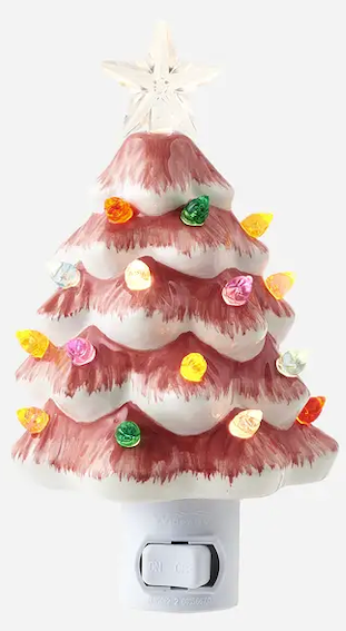 Pink ceramic Christmas tree night night.
