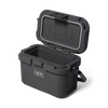 Black YETI cooler with open lid on a white background