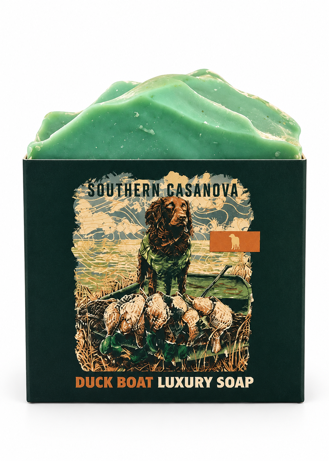 A green handcrafted soap bar displayed in its branded black packaging box, which features a vintage-style illustration of a dachshund in a duck boat with the text 'SOUTHERN CASANOVA' and 'DUCK BOAT LUXURY SOAP'.