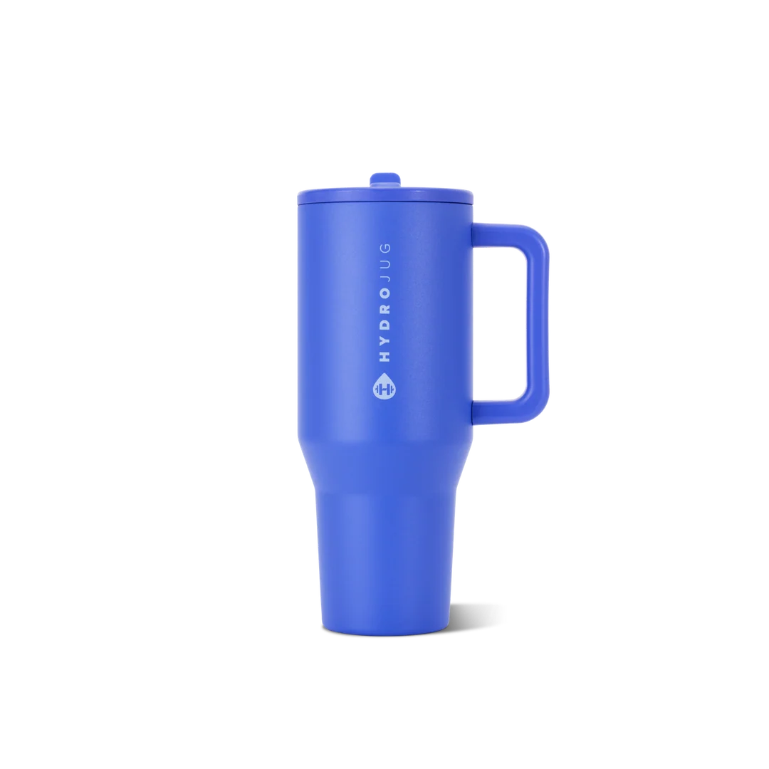 A blue HydroJug travel tumbler with a matching lid and handle, featuring the HydroJug logo printed vertically on the side, set against a plain white background.