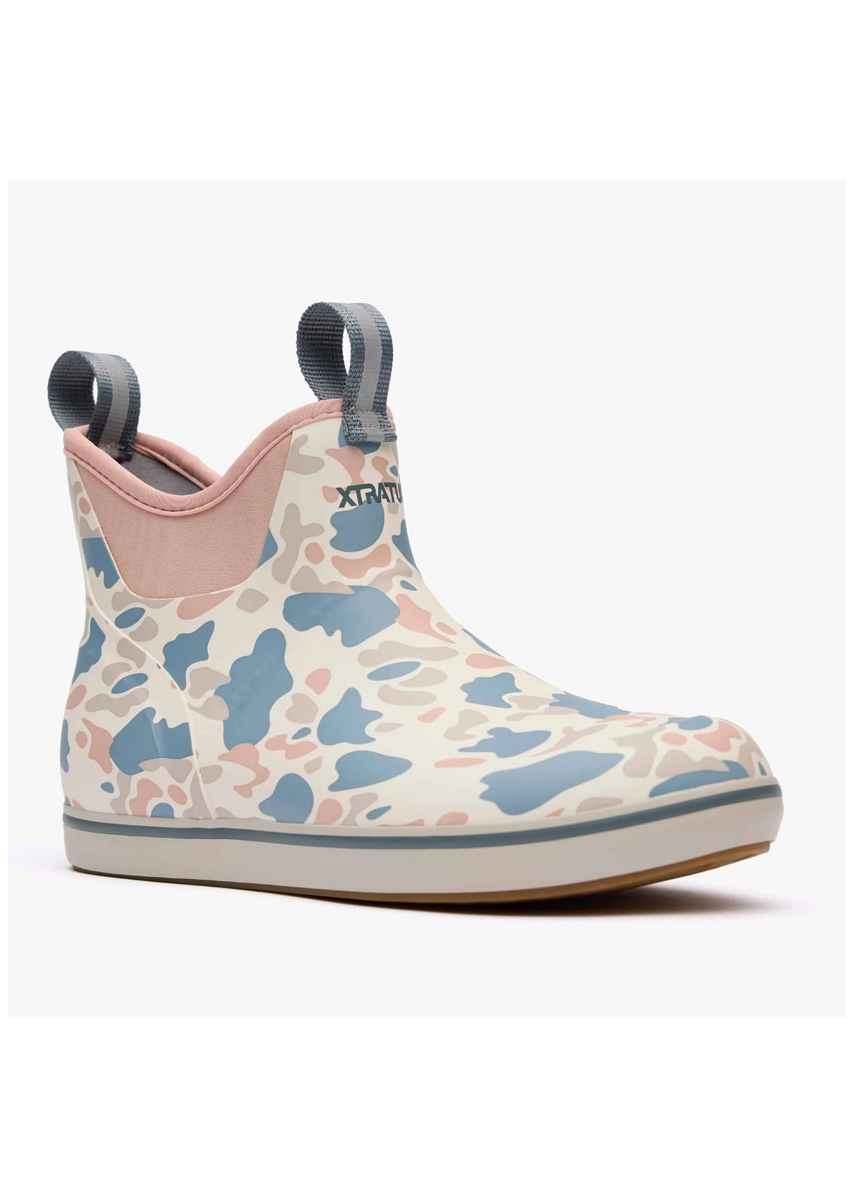 A single ankle-length rain boot with a light beige base and a blue, pink, and beige camouflage pattern. It features a pink collar, gray pull tabs, and a white sole.