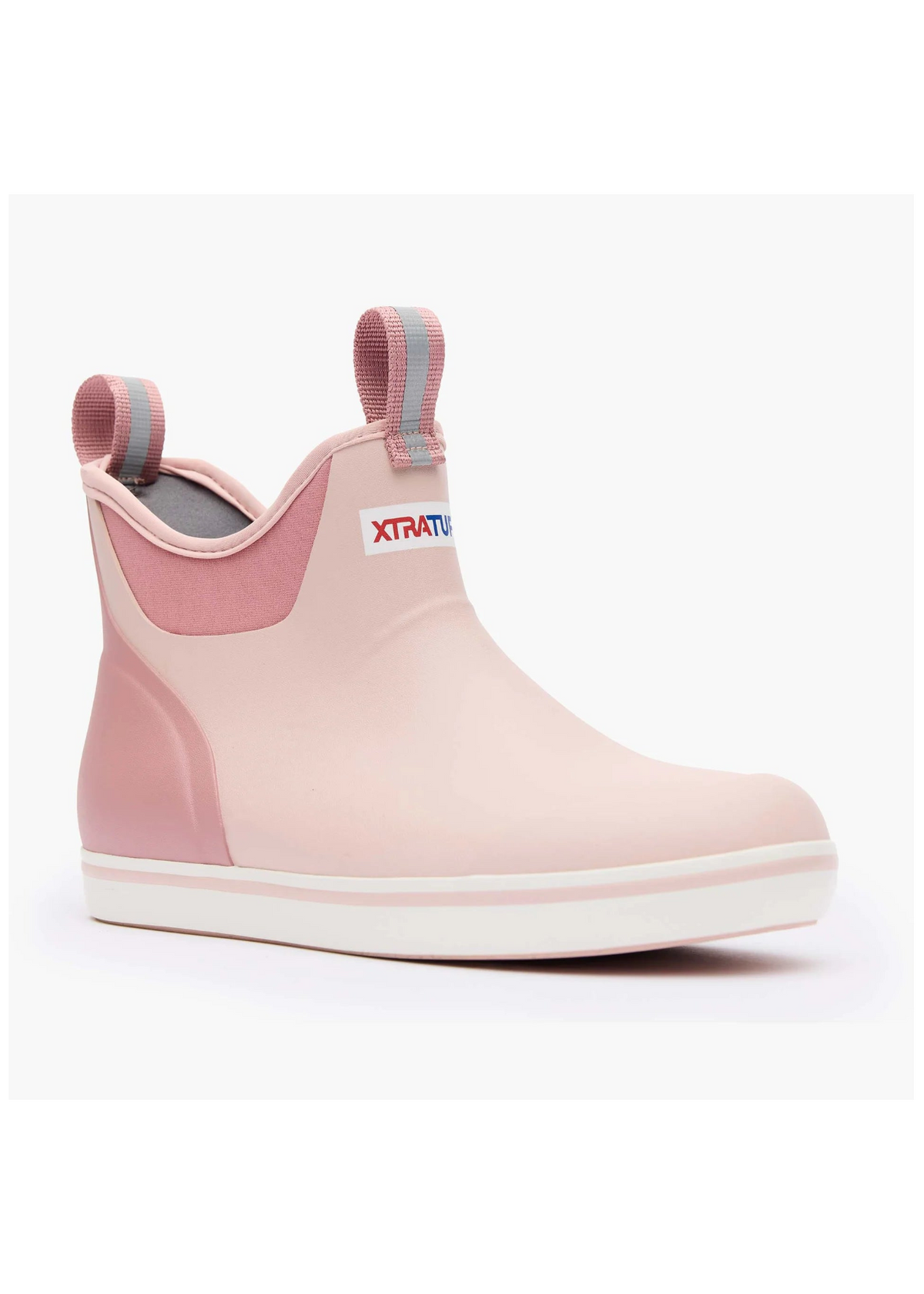 A light pink Xtravagant waterproof ankle boot with a pink elastic side panel, pink pull tabs, and a white sole, shown from a side profile on a white background.
