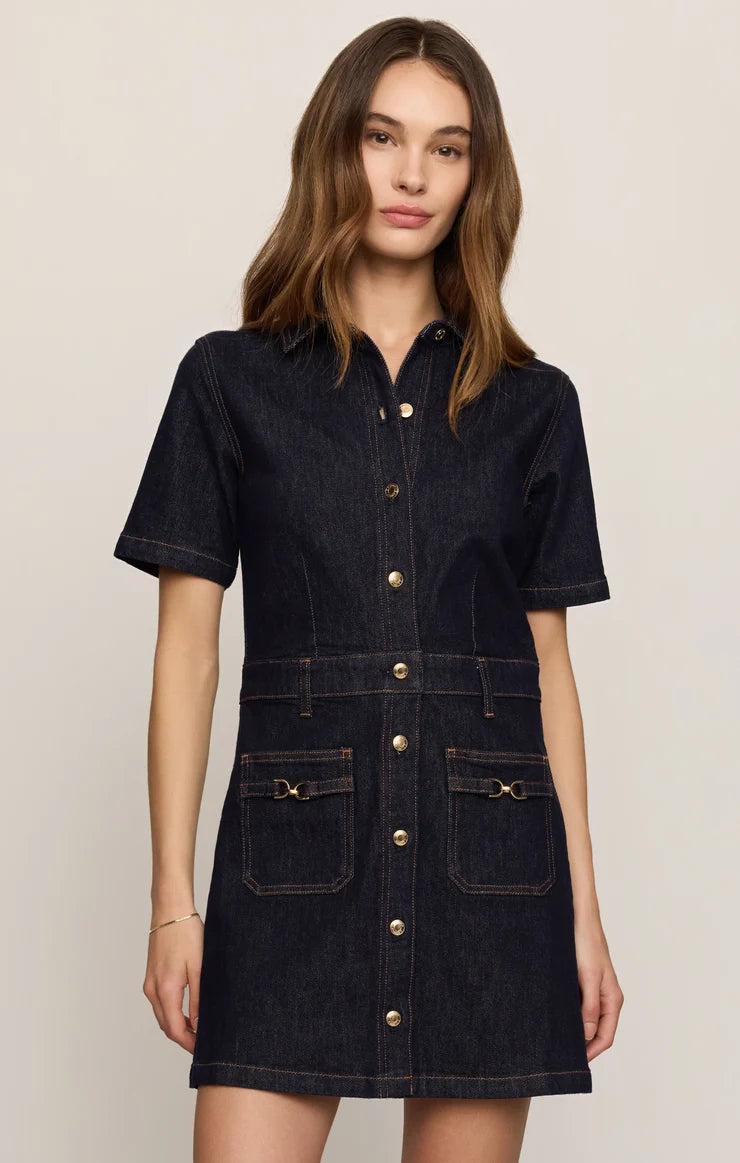 woman modeling denim button down dress with loafers 