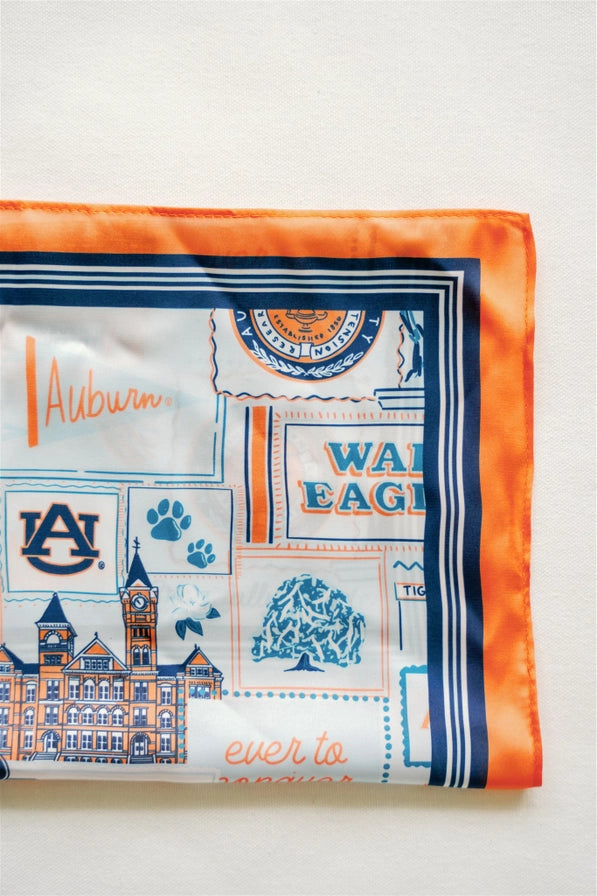 Auburn University-themed fabric square with logos and text on a white background