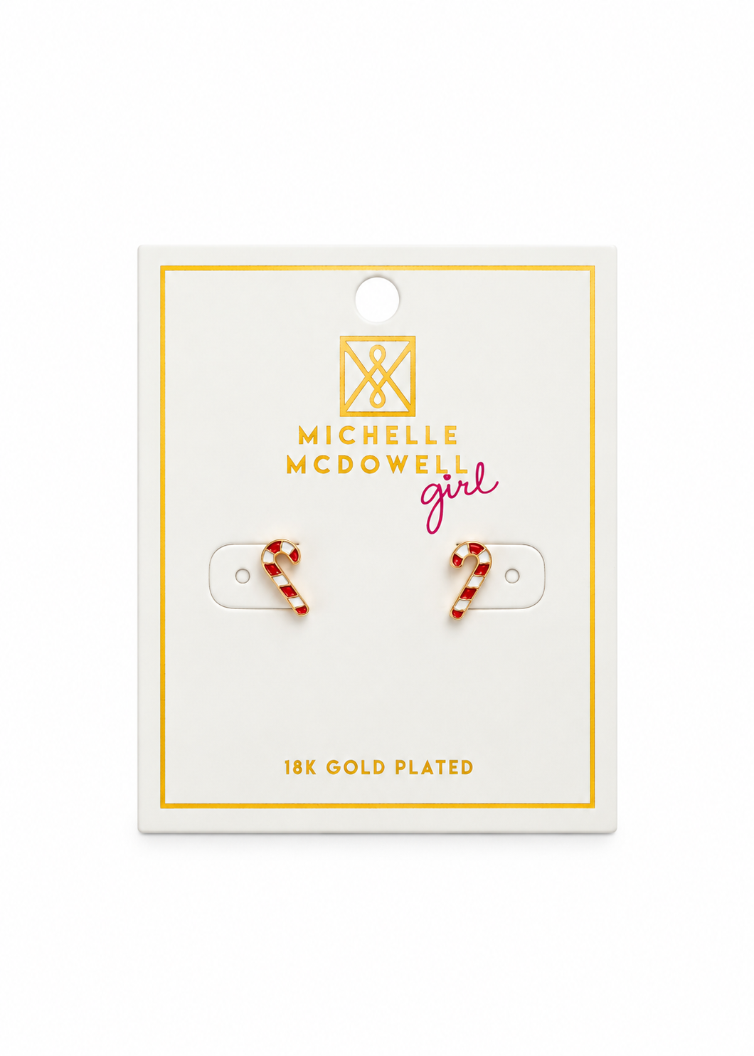 A pair of Michelle McDowell 18K gold-plated stud earrings shaped like candy canes, mounted on a white display card with gold and pink branding.