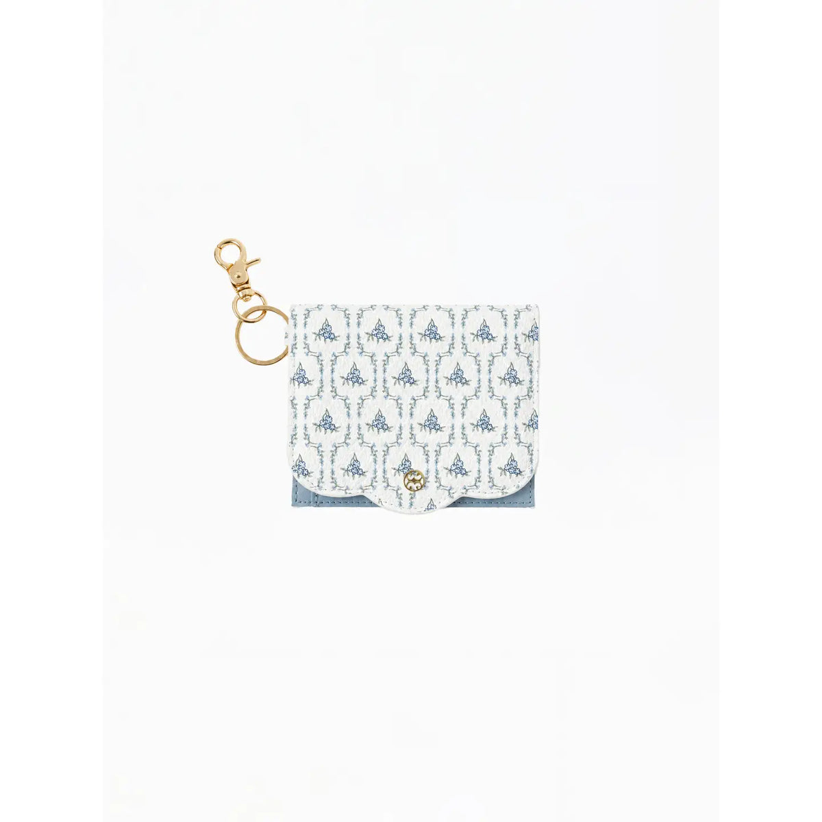 A small white card holder or pouch with a repeating blue floral trellis pattern, featuring a gold-tone lobster clasp and ring on the left side and a small gold emblem on the front flap, shown on a plain white background.