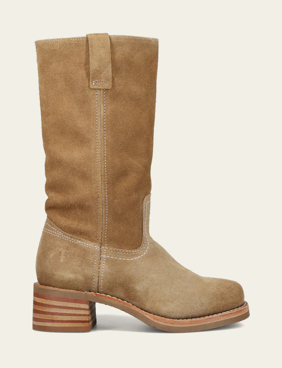 Tan suede boot on a light gray background