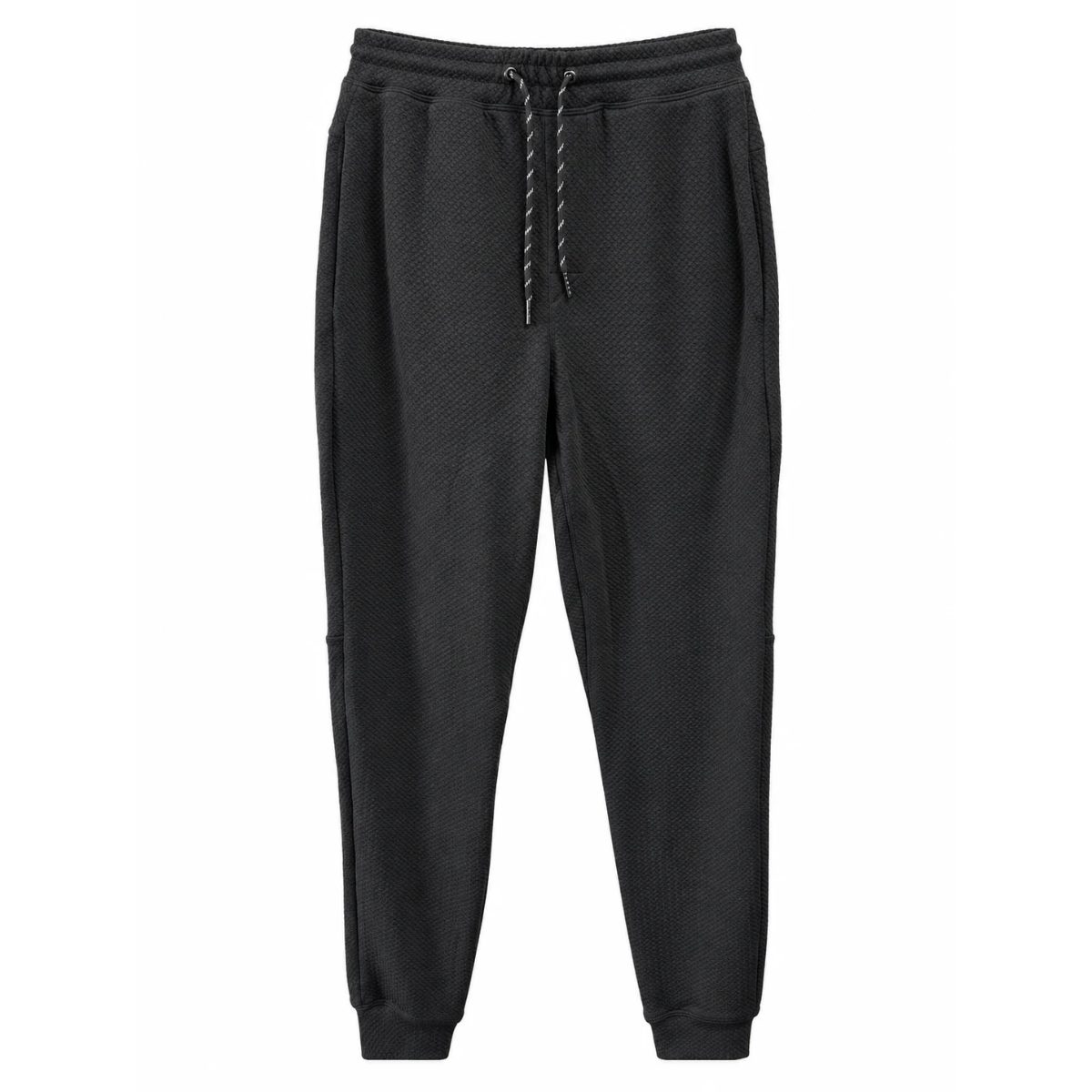 Patterned pants on a hanger against a white background