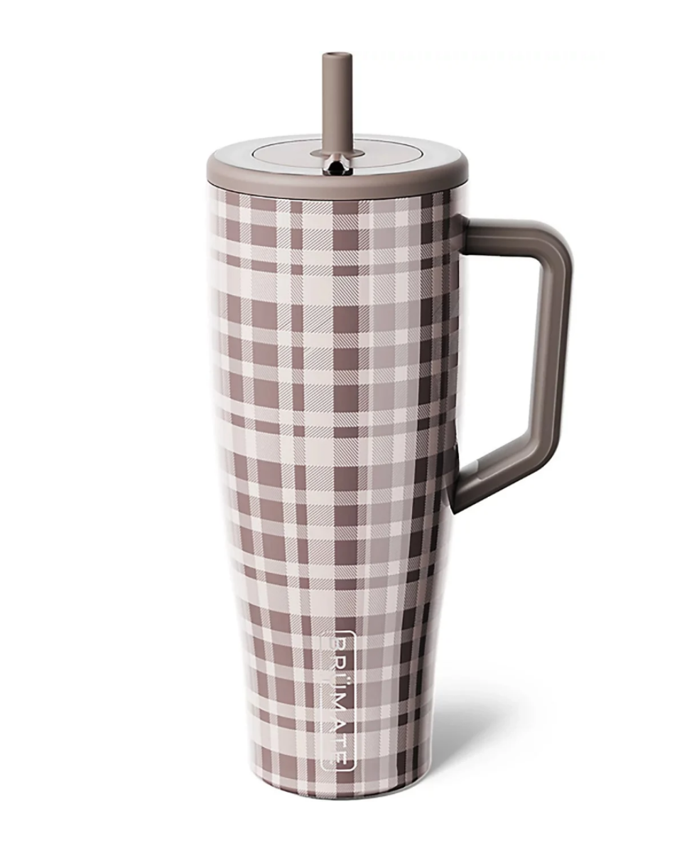 A tall handled tumbler with a brown and beige plaid pattern, featuring a matching brown lid with a straw and a brown handle, shown on a white background.