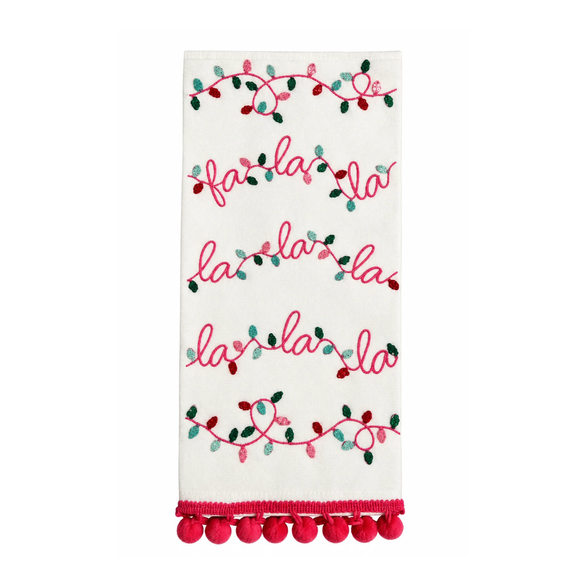 An off-white kitchen towel featuring 'la la la' embroidered in pink cursive script, interspersed with green and pink berry garlands, finished with a bright pink pom-pom fringe at the bottom.