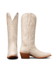 Pair of cream-colored cowboy boots with brown soles on a white background