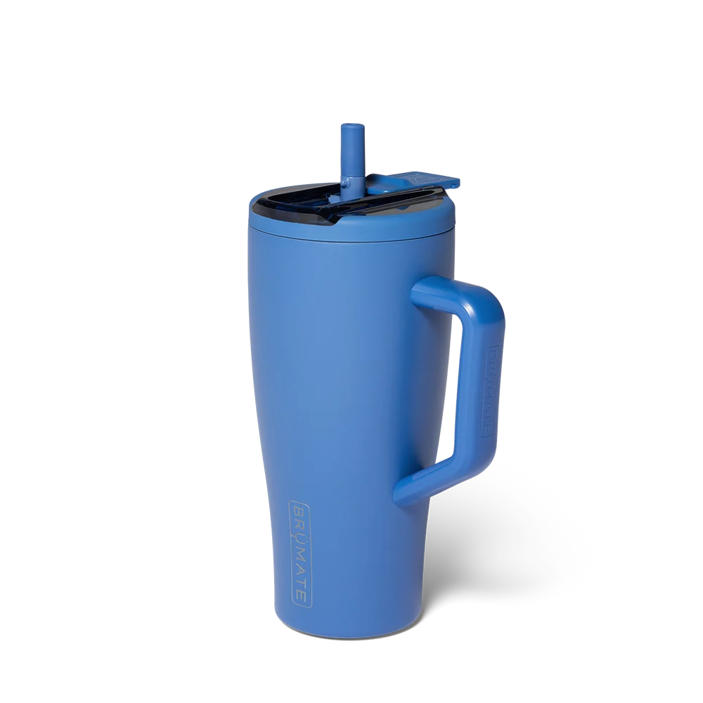 A blue insulated travel tumbler with a matching blue handle, lid, and straw, shown on a clean white background.