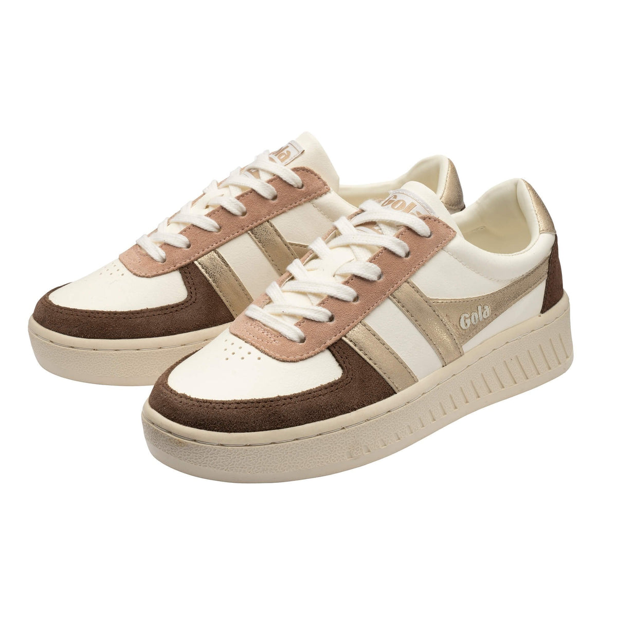 A pair of low-top platform sneakers in cream, beige, and brown suede, featuring white laces and a thick cream platform sole, shown on a plain white background.