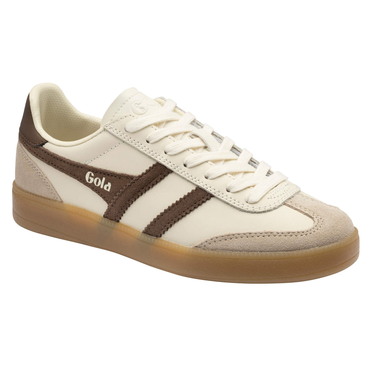A low-top sneaker in off-white suede and leather with dark brown stripes and a gum sole, featuring the brand name 'Gold' printed on the side.
