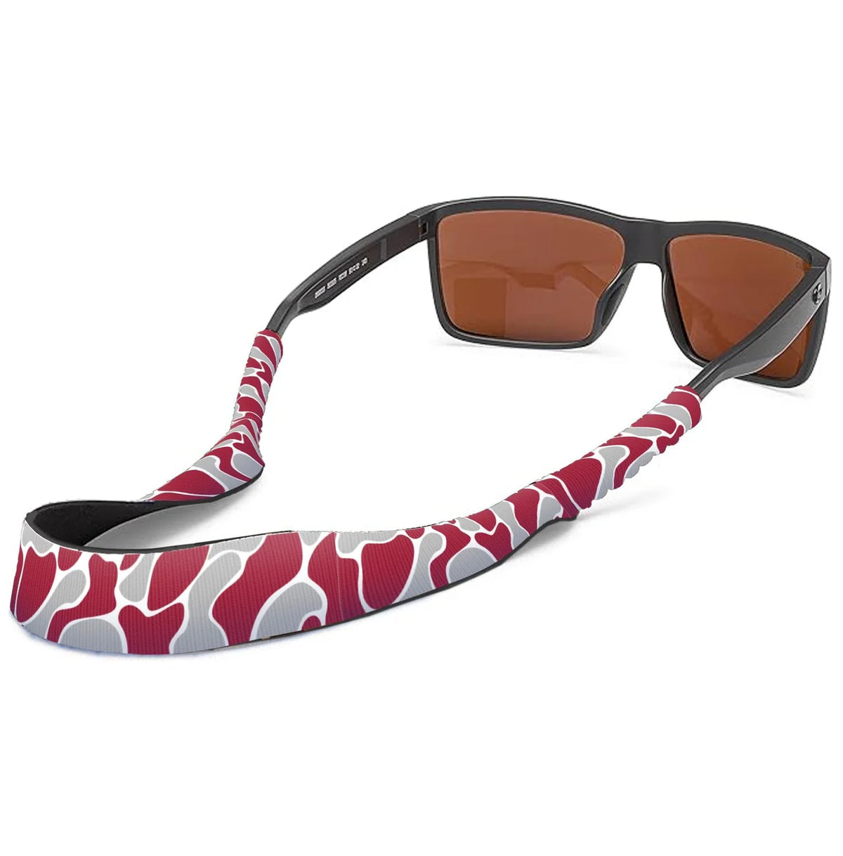 A pair of sunglasses with a red, white, and gray camouflage patterned strap, shown on a clean white background.