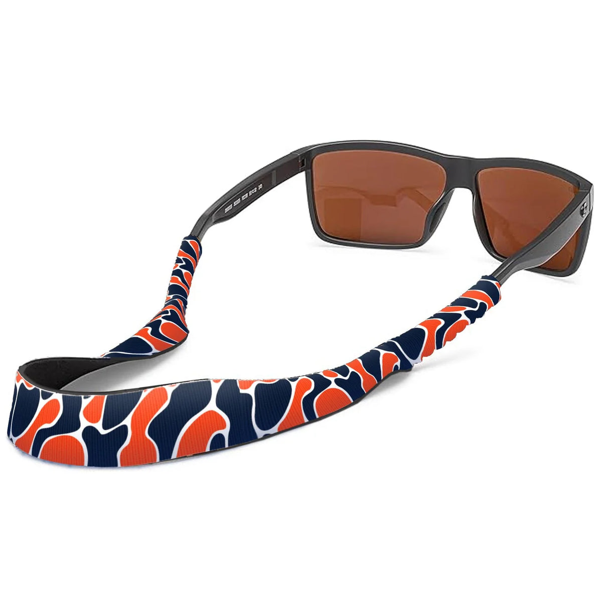 A pair of sunglasses with a thick black frame and orange-brown lenses, featuring a matching patterned neck strap in orange, navy blue, and white. The brand name 'SOLIS' is visible on the temple arm.