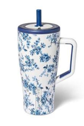 A tall insulated tumbler with a handle, featuring a blue floral pattern on a white background, a blue lid, and a blue straw, shown on a plain white background.