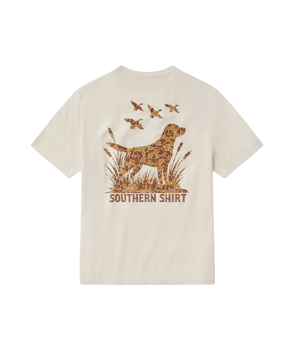 An off-white short-sleeve t-shirt with a large graphic print on the back. The print features a hunting dog in a leopard print pattern standing in reeds, with three birds flying above and the text 'SOUTHERN SHIRT' printed below.
