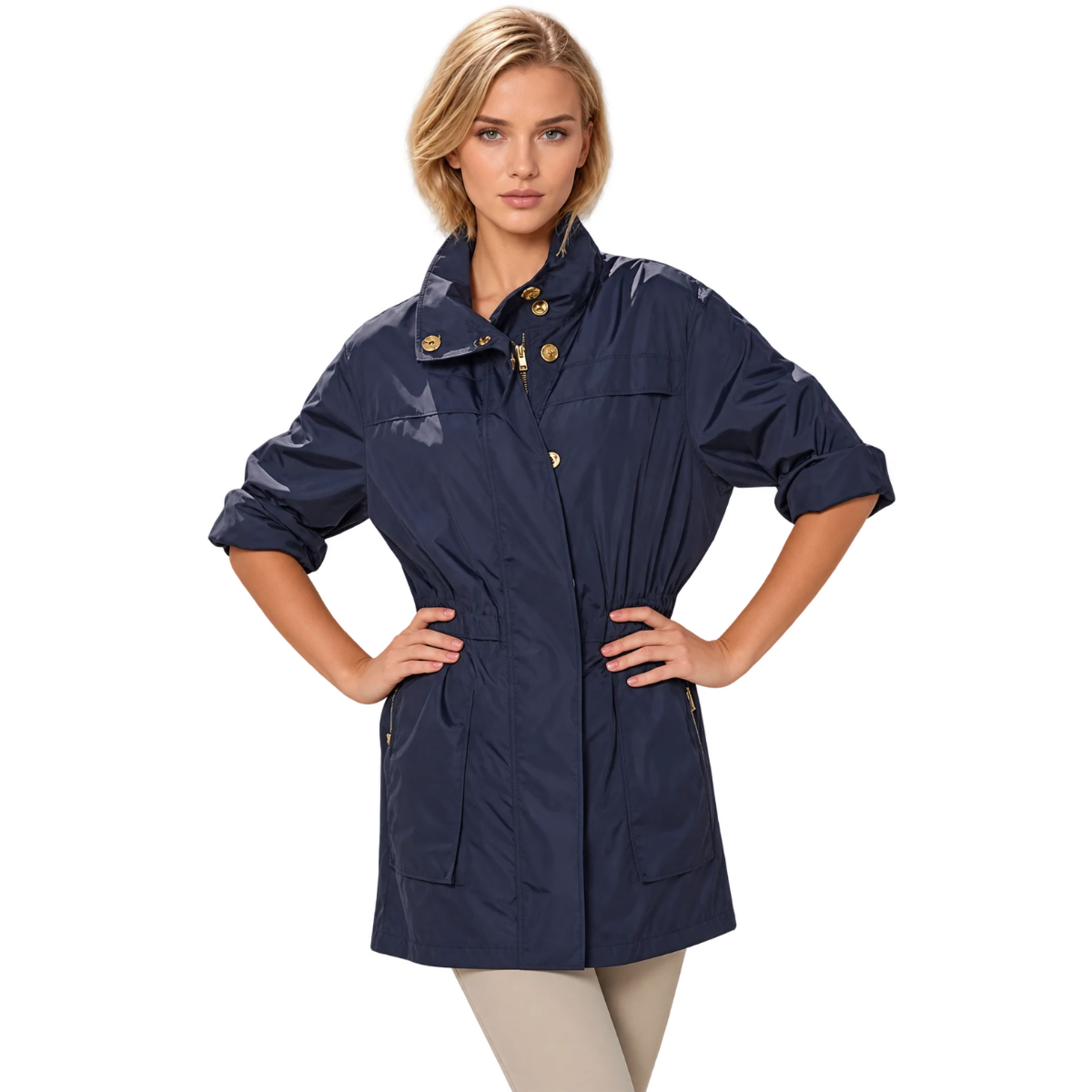 A woman modeling a navy blue waterproof jacket with gold buttons, photographed against a solid white background.