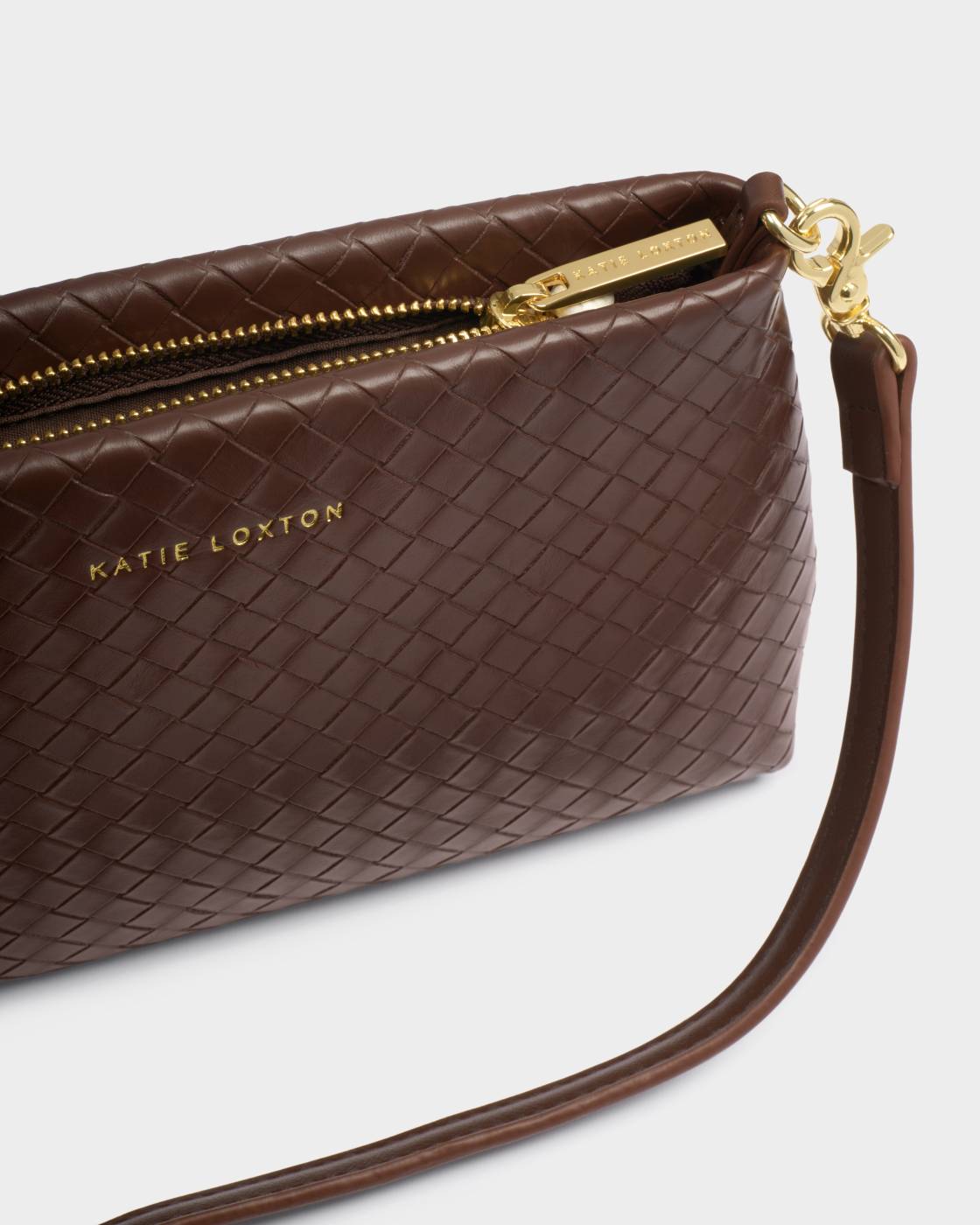 Brown textured handbag with gold zipper and 'Katie Loxton' branding on a light gray background