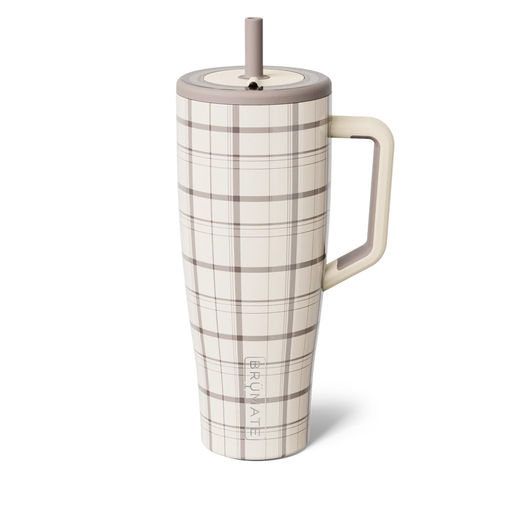 A tall insulated tumbler with a handle and straw, featuring a cream and taupe plaid pattern. The brand name 'RUMI TE' is vertically printed near the bottom.