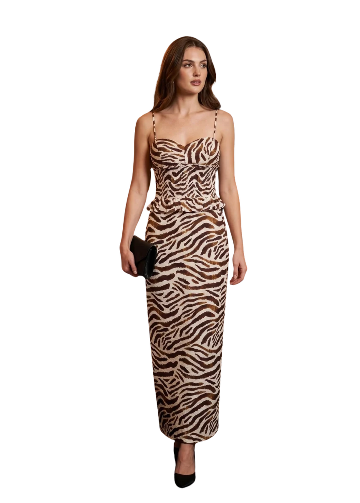 A woman modeling a strapless zebra-print maxi dress with a sweetheart neckline, holding a black clutch, set against a plain white background.