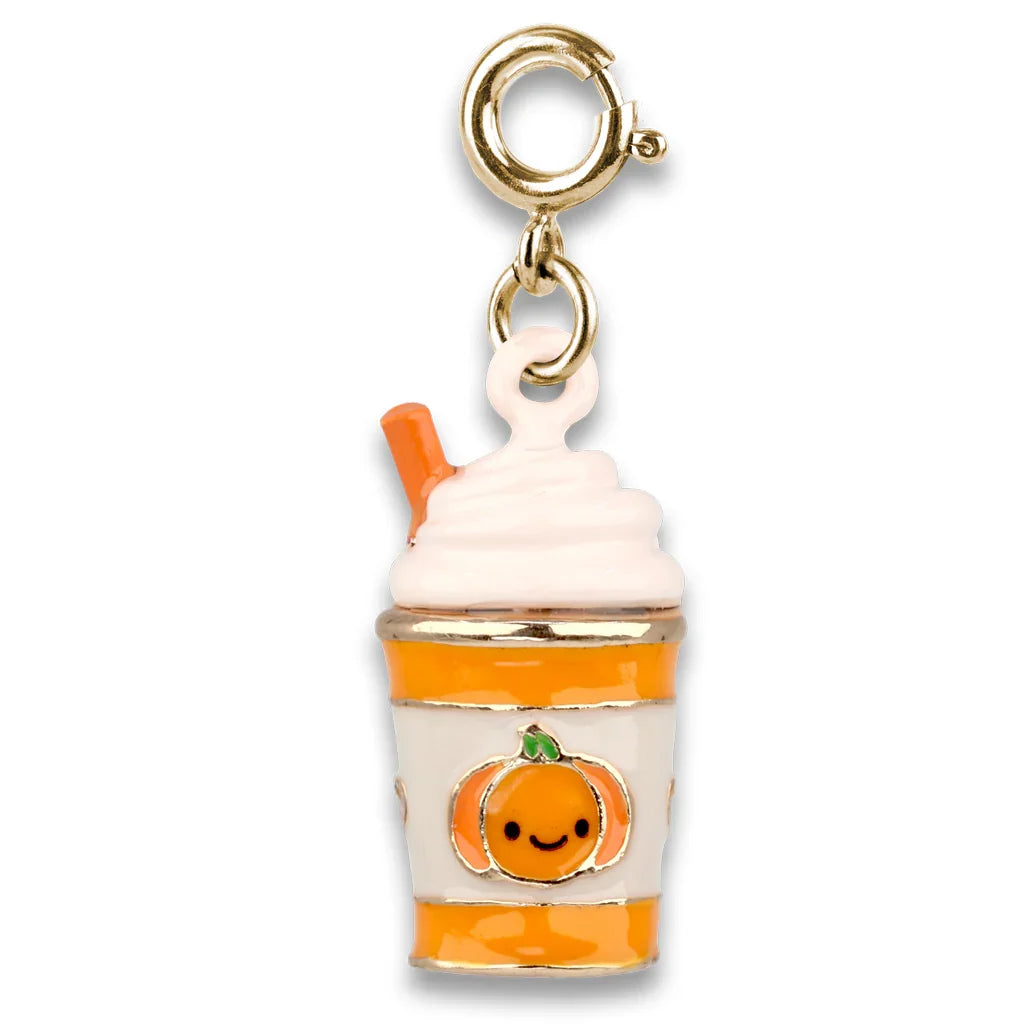 A pumpkin-themed iced coffee charm with a gold-tone lobster clasp, featuring a white whipped cream top with an orange straw, an orange pumpkin face on a white cup, and orange striped bands.