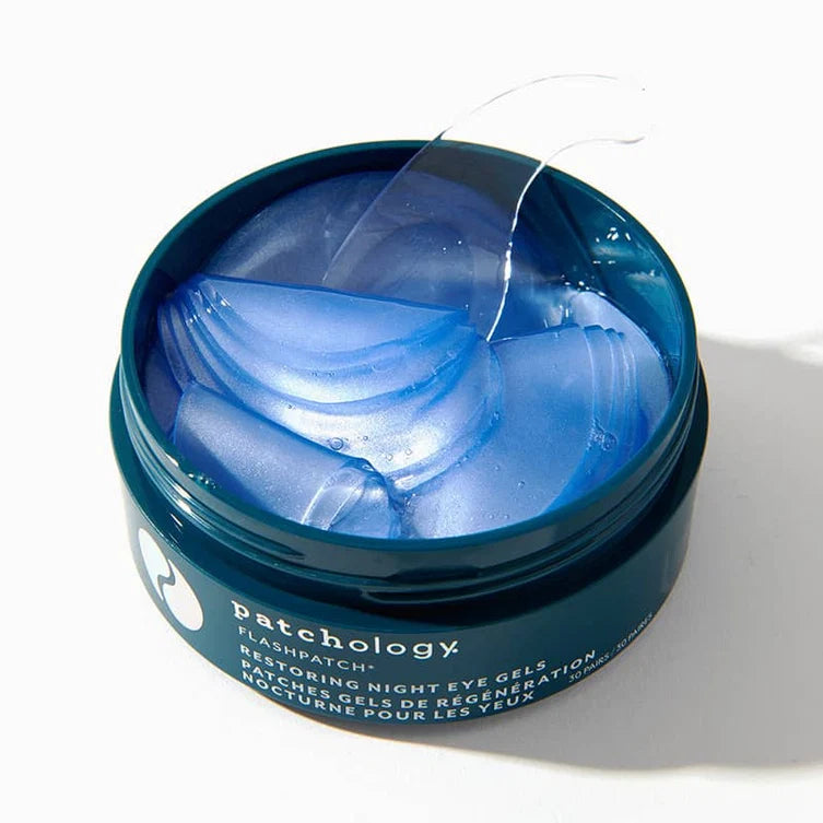 Patchology eye gel container with blue gel and patches on a white background