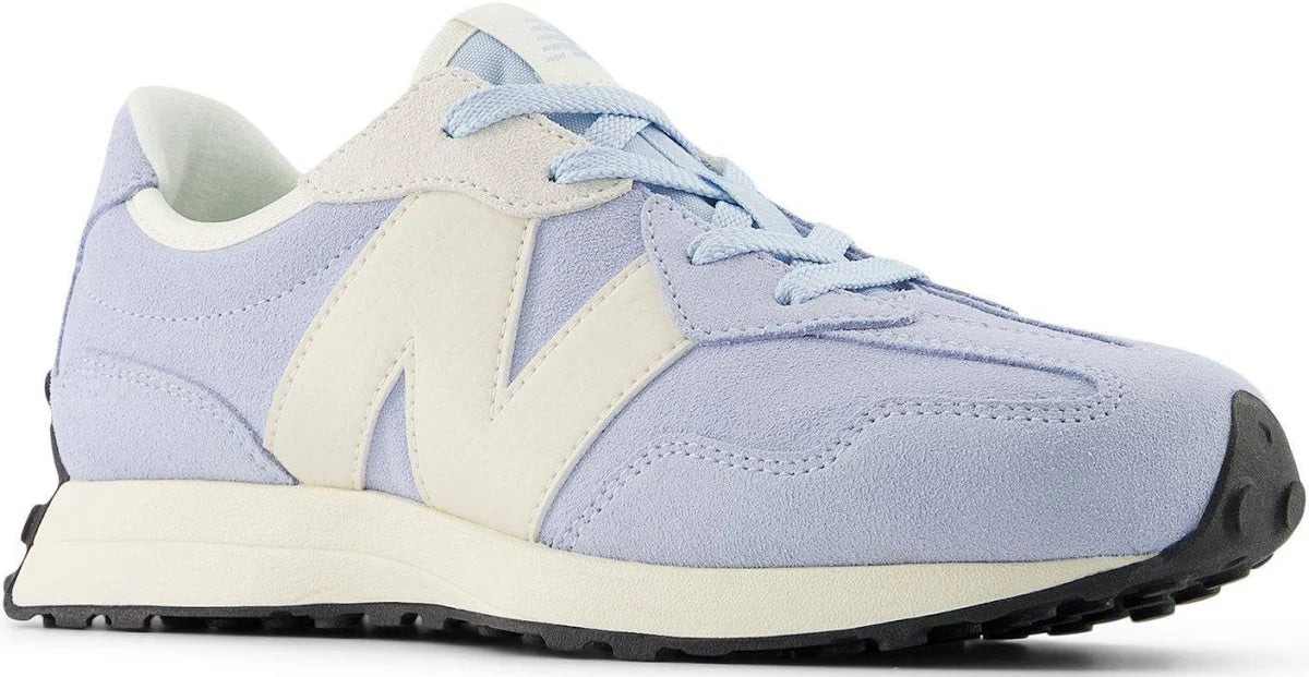 A light blue and cream New Balance sneaker shown from a side profile view against a white background.