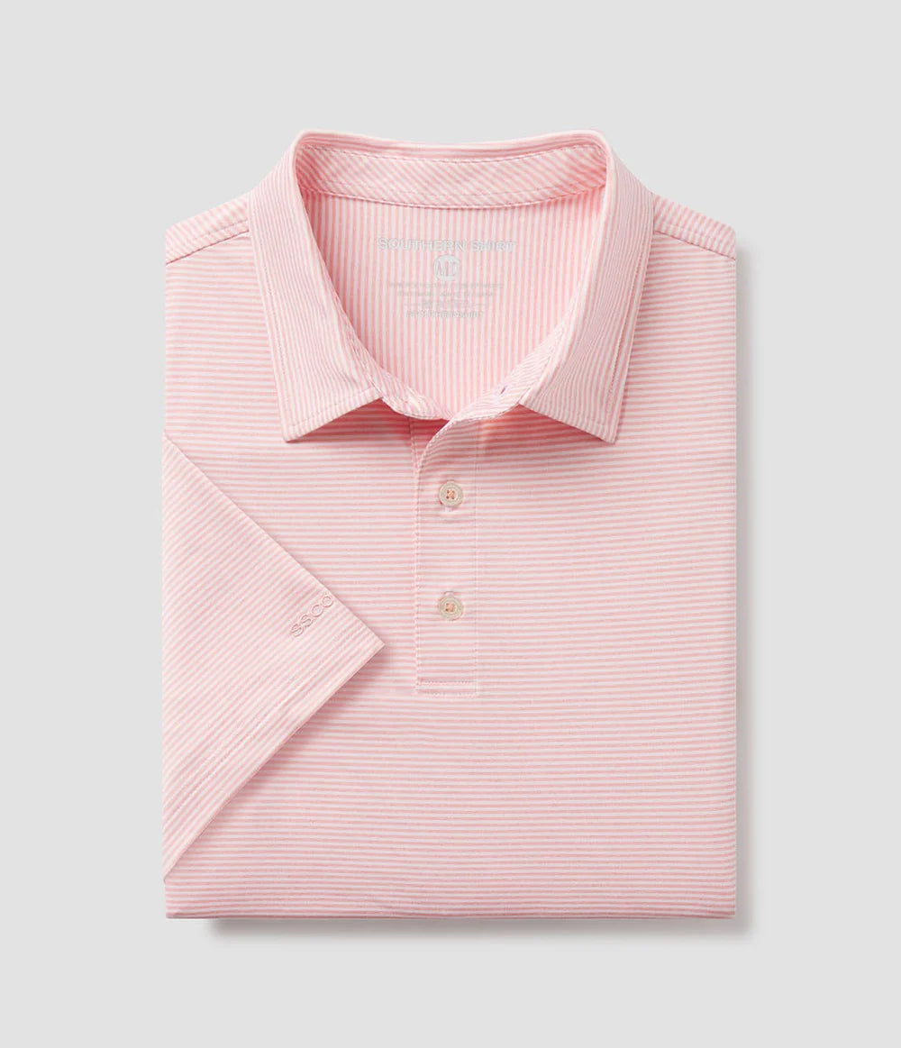 folded peach and white striped polo
