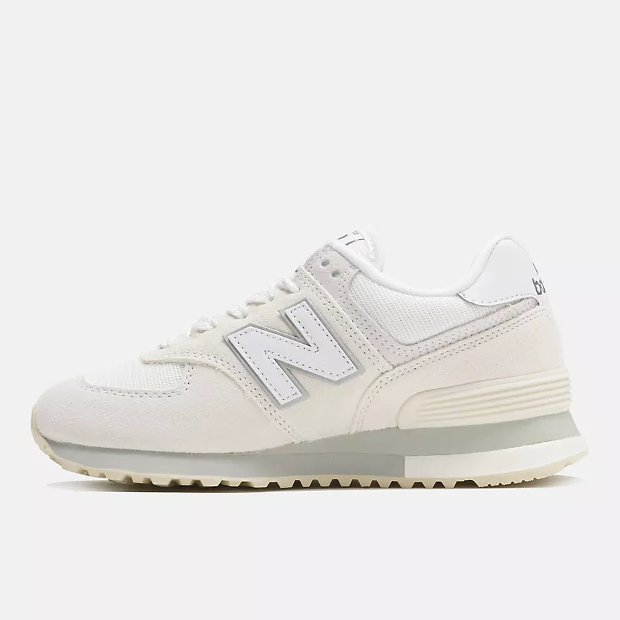 A classic New Balance sneaker in off-white and light gray, shown from a side profile view against a clean, light gray background.