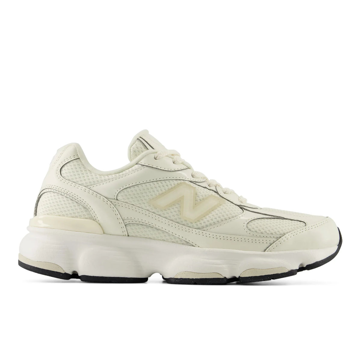 A single New Balance sneaker in off-white and cream with a chunky sole, shown from the side profile on a white background.