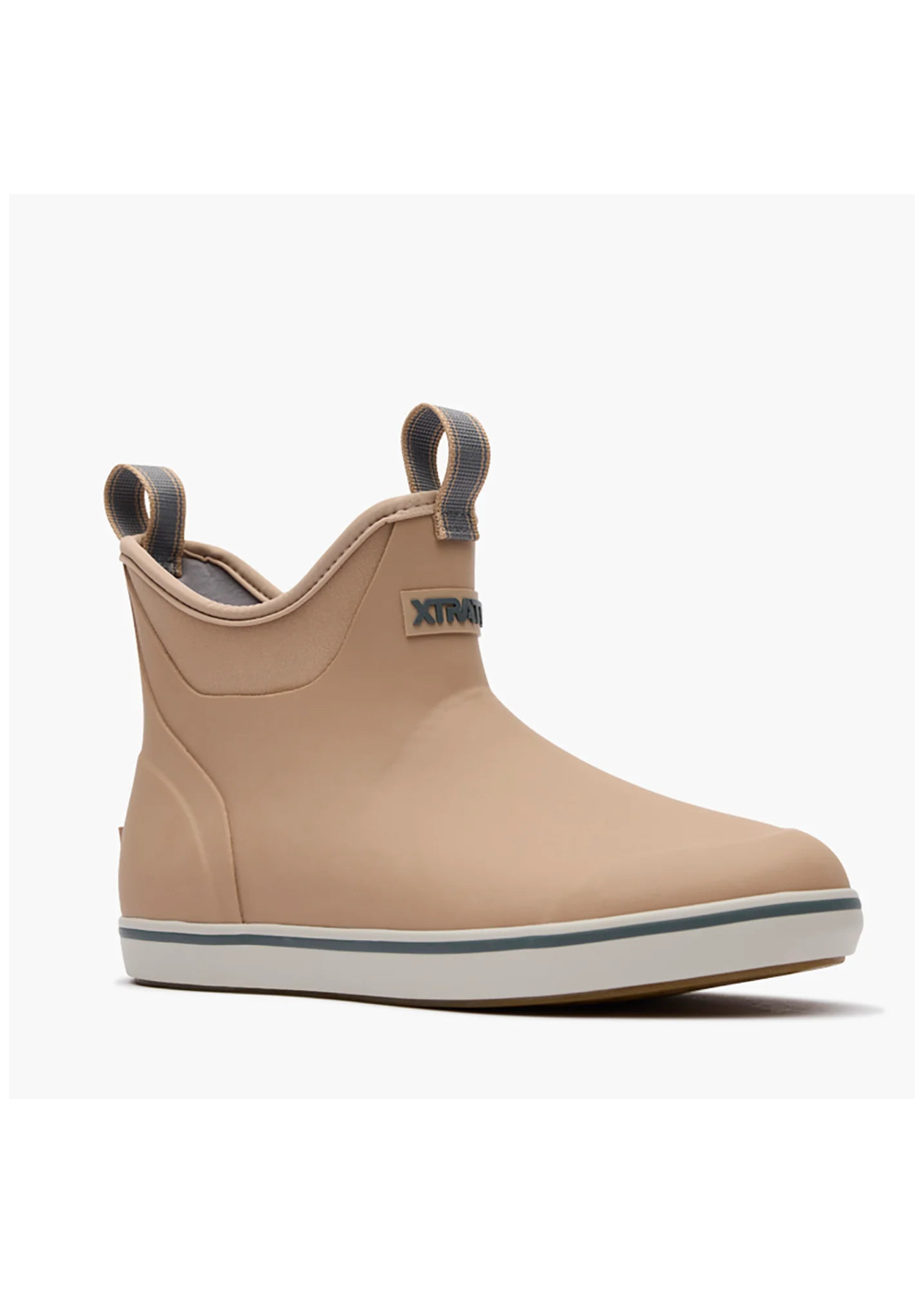 A single Xtranaut ankle rain boot in a light tan/beige color, featuring a white and dark gray sole and pull tabs, shown against a plain white background.